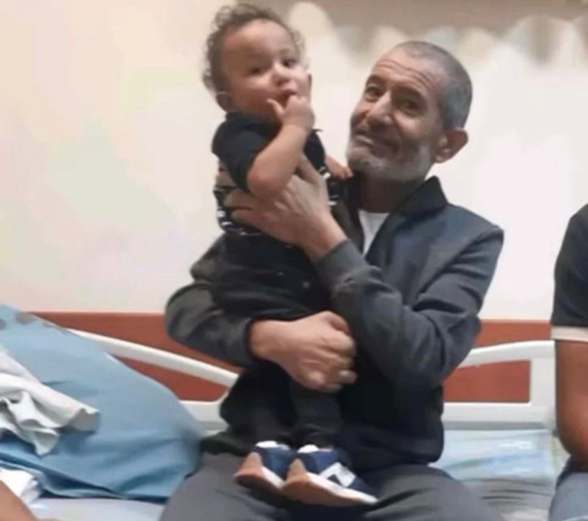 Israel's tweet photo. Rescued hostage Farhan, who spent 326 days captive in Gaza, hugs his youngest son 💙.

We will not rest until every last hostage comes home and gets to hug their loved ones. https://t.co/yitYTaBvw9