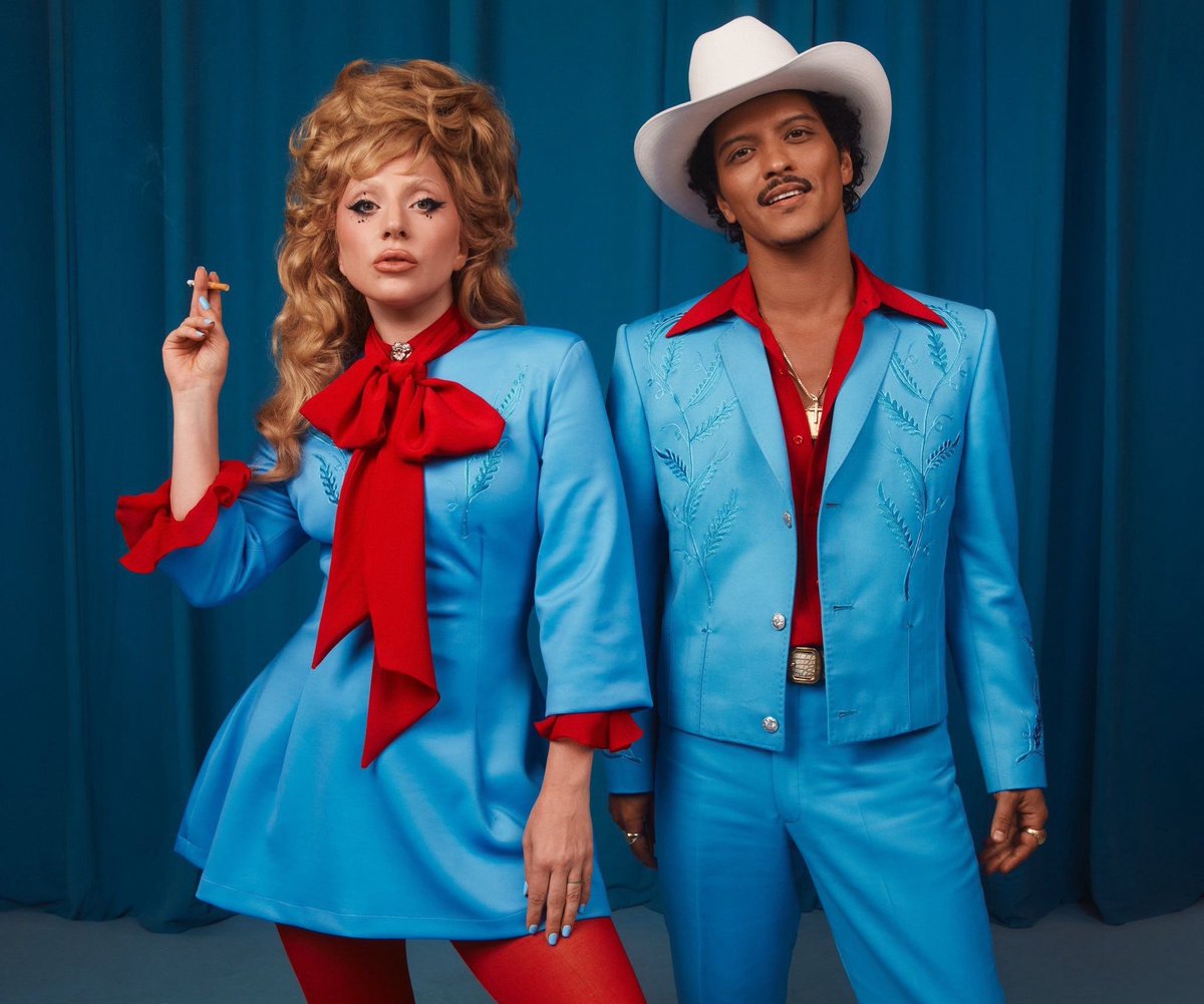 PopCrave's tweet photo. Bruno Mars joins in on the joke that Lady Gaga collaborated with him to get him out of debt. https://t.co/ZLldOADIQa