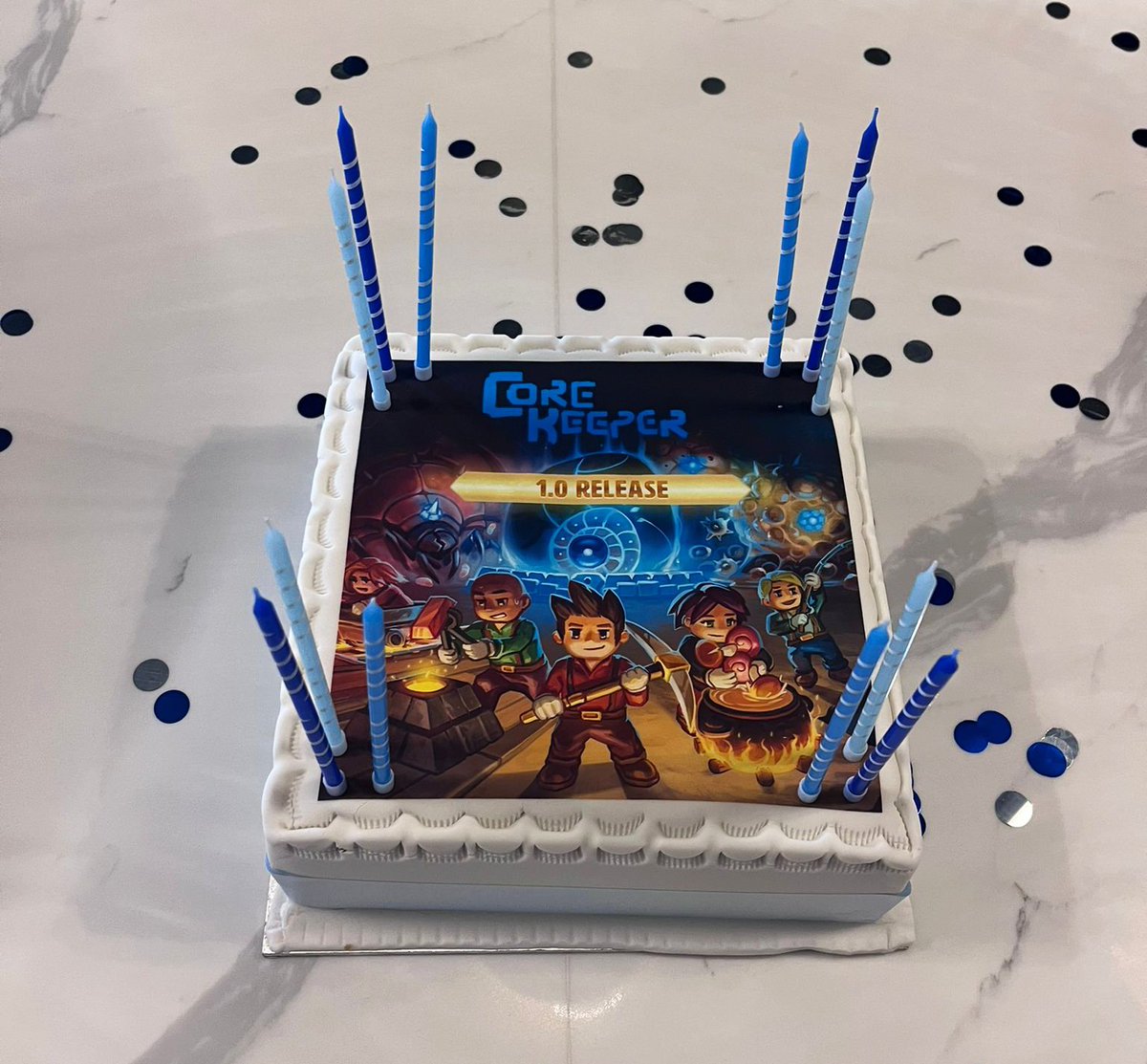 FireshineGames's tweet photo. It's @CoreKeeperGame Cake Day in the office! 💙🎂

Here's Colin the Caterpillar cosplaying as Ghorm the Devourer. 🤣

Core Keeper's 1.0 release has been incredible so far, and there's been big celebrations at the Fireshine HQ! Thanks to everyone who has been playing! 🫶 https://t.co/3pN4RL8avl