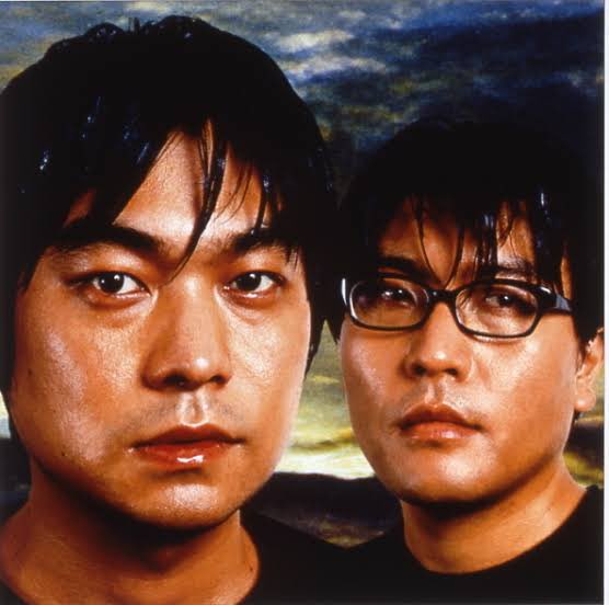 この絵のポイントは
・手前が弟、奥が兄
・兄がメガネをかけている
が元ネタと同じところ 