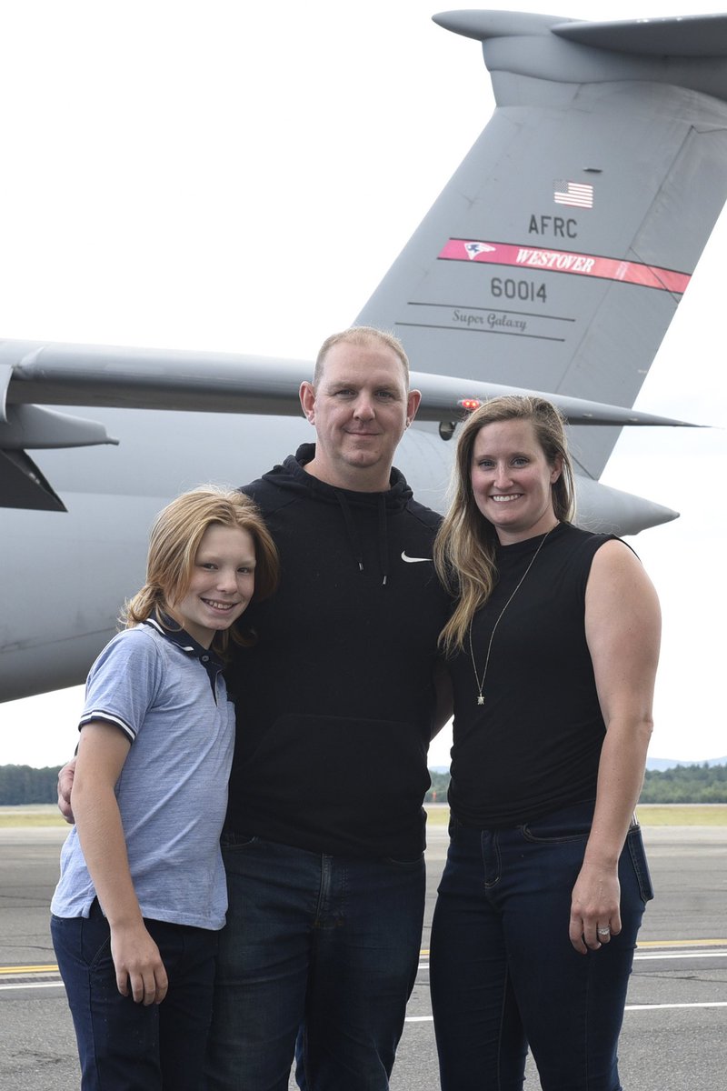 Master Sgt. Erik Richards celebrates his fini-flight with his family at Westover Air Reserve Base Hanger, Aug. 22.  He served with the 337th Airlift squadron since 2011.  Richards serves as a deputy with the Cumberland County, ME Sheriff’s Department.