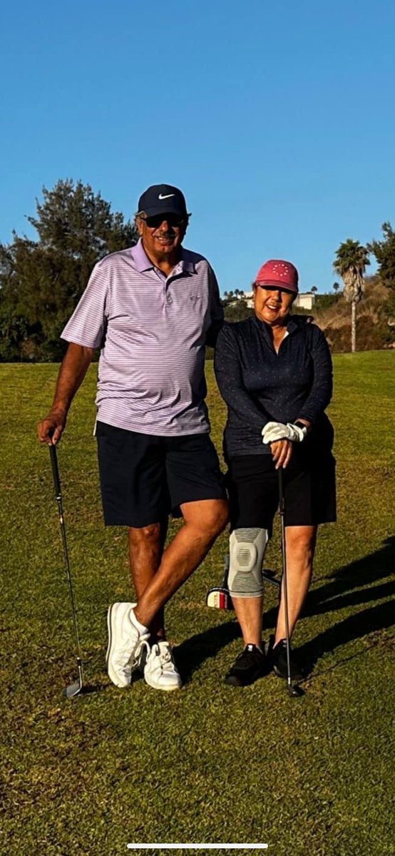 Golfing with my precious wife, enjoying our retirement.