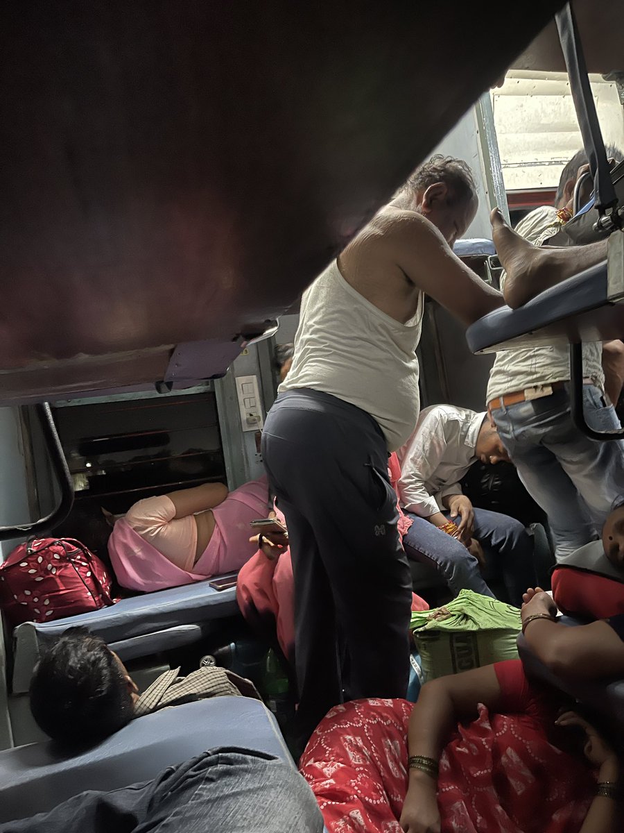 ram8chekuri's tweet photo. @RailwaySeva where is TTE &amp; RPF while general ticket passenger chocked into Sleeper class &amp; not leaving any space for even toilets https://t.co/5eIAa0RSzt