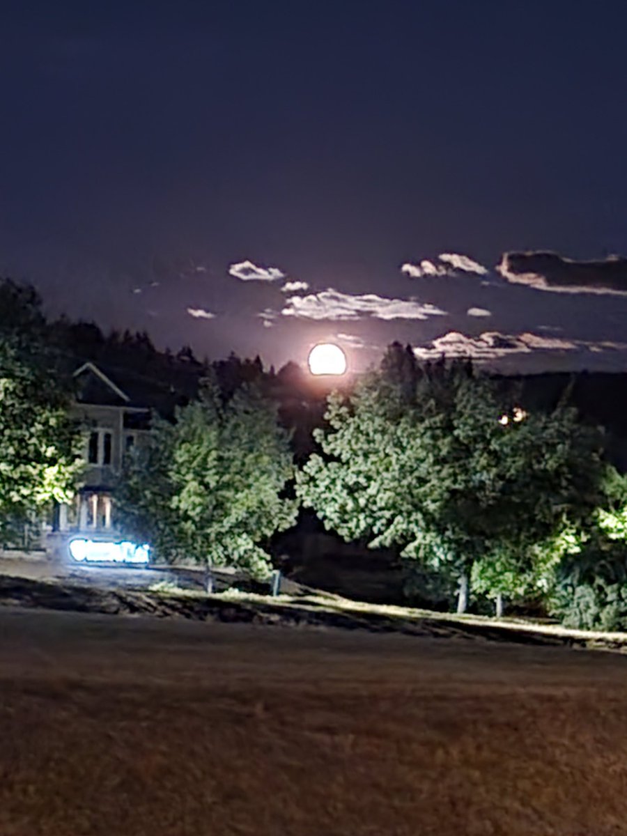 Super moon coming up over the mountain.