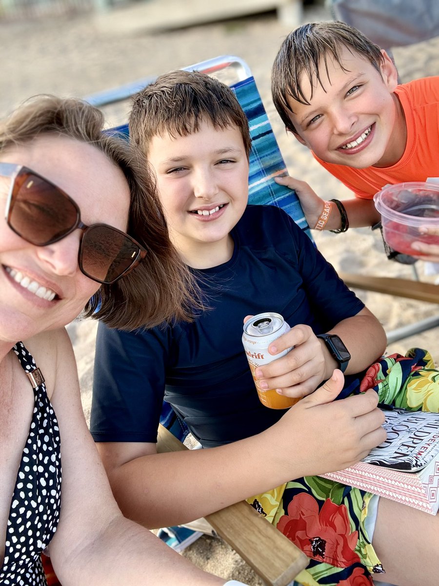 Finishing off the summer reading list and the CSA watermelon. #beachday