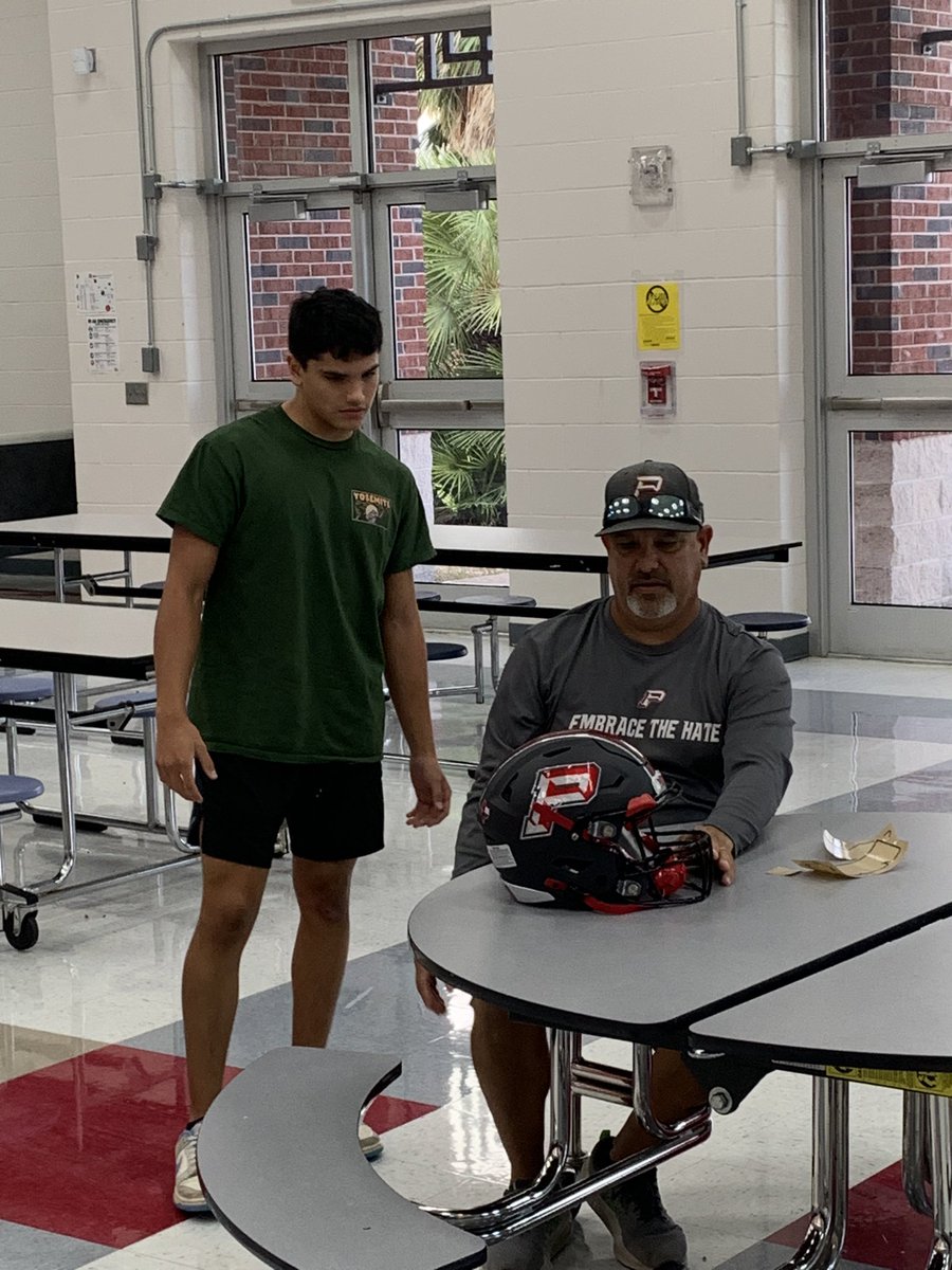 DBack_Football's tweet photo. Head Coach Eddie Galindo helping his son Malakai put on his stickers!
#DecalsWithDad https://t.co/p9EfaJweis