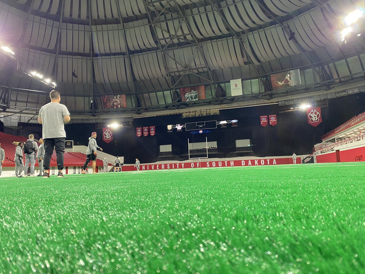 DavidTukesbrey's tweet photo. My first time in the DakotaDome! Brand new turf looks great; first game played on it tomorrow night. This place will be cranked up, black out theme and the fifth ranked team in the nation to host. Let’s play some football &amp; have some fun. Football is BACK! https://t.co/VCPN4z2nuJ