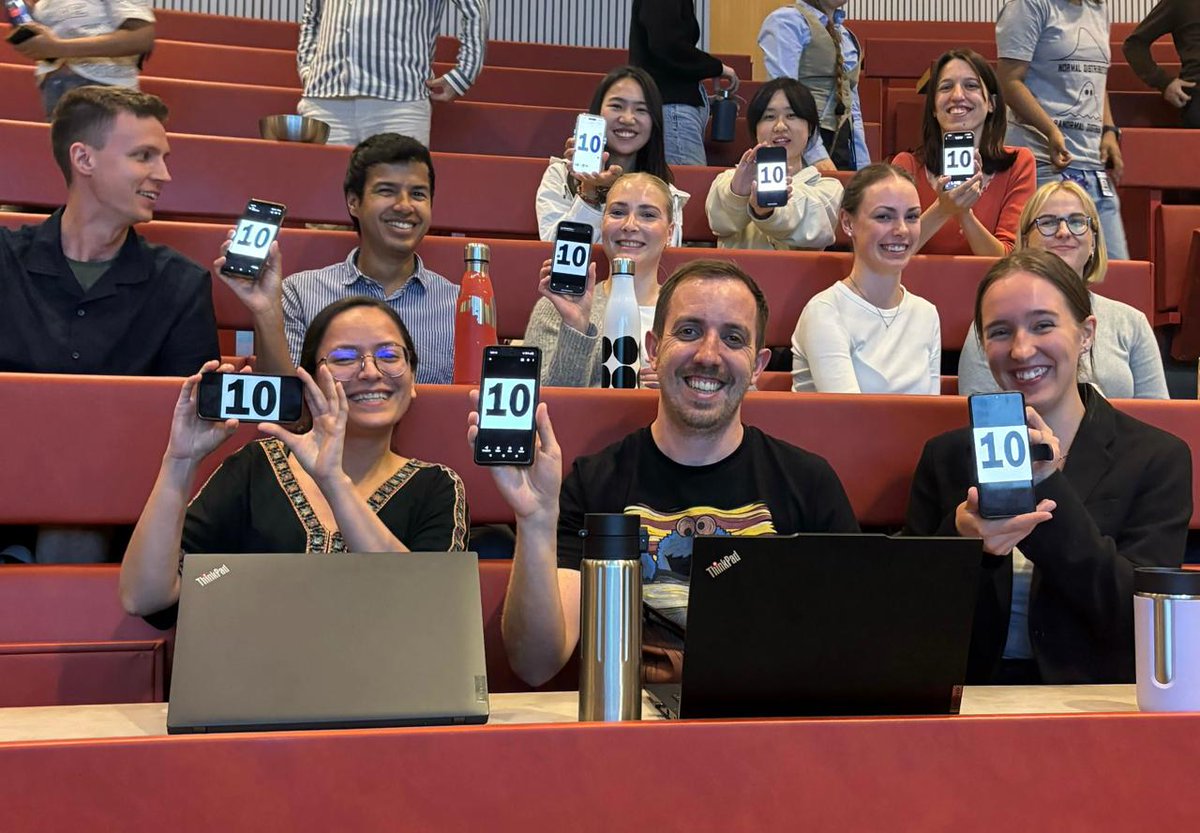 Huge congrats to <a href="/adajnq/">Ada Junquera</a> for her outstanding presentation at the ONCOSY progress report! She absolutely nailed it, and we were so proud that we all gave her a perfect 10 (literally, with our phones 📱)! 🌟 Also, a special shoutout for debuting our new lab logo! #ProudLab