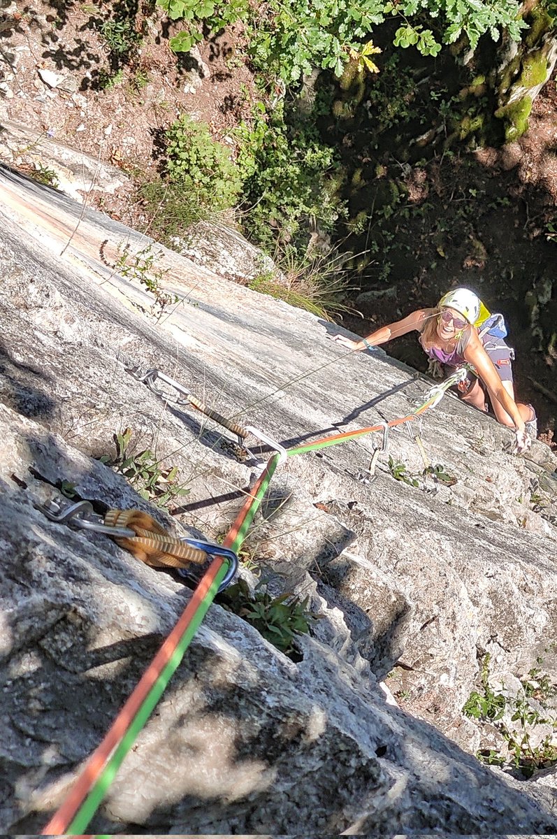 Becky pulling over a roof onto the slab with no holds. One of the hardest F6b pitches I've ever done.