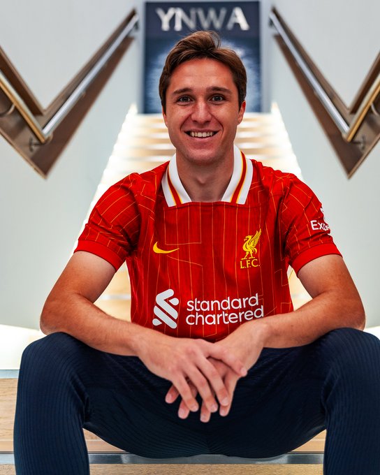 Chiesa sat down on the stairs at the AXA Training Centre