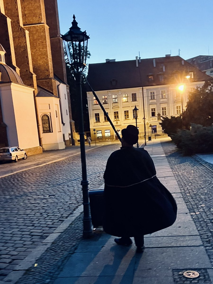 Wroclaw Poland is only one of two European cities that still has a Lamplighter. I found him tonight….