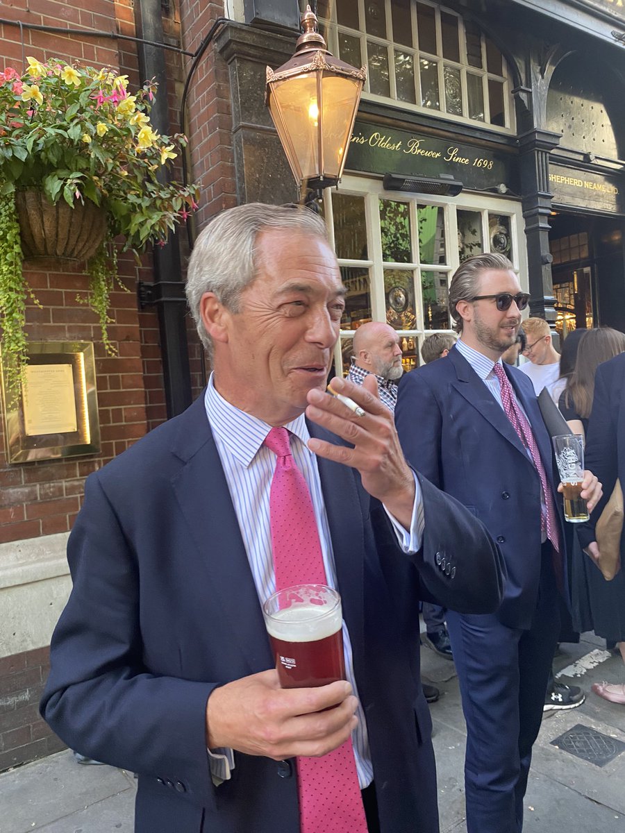 christopherhope's tweet photo. NEW 

**Nigel Farage cigarette ban pub protest**

Reform UK leader Nigel Farage MP is staging a protest against Labour’s mooted cigarette ban outside a pub in central London now 👇👀 https://t.co/kpIkbzqSnJ