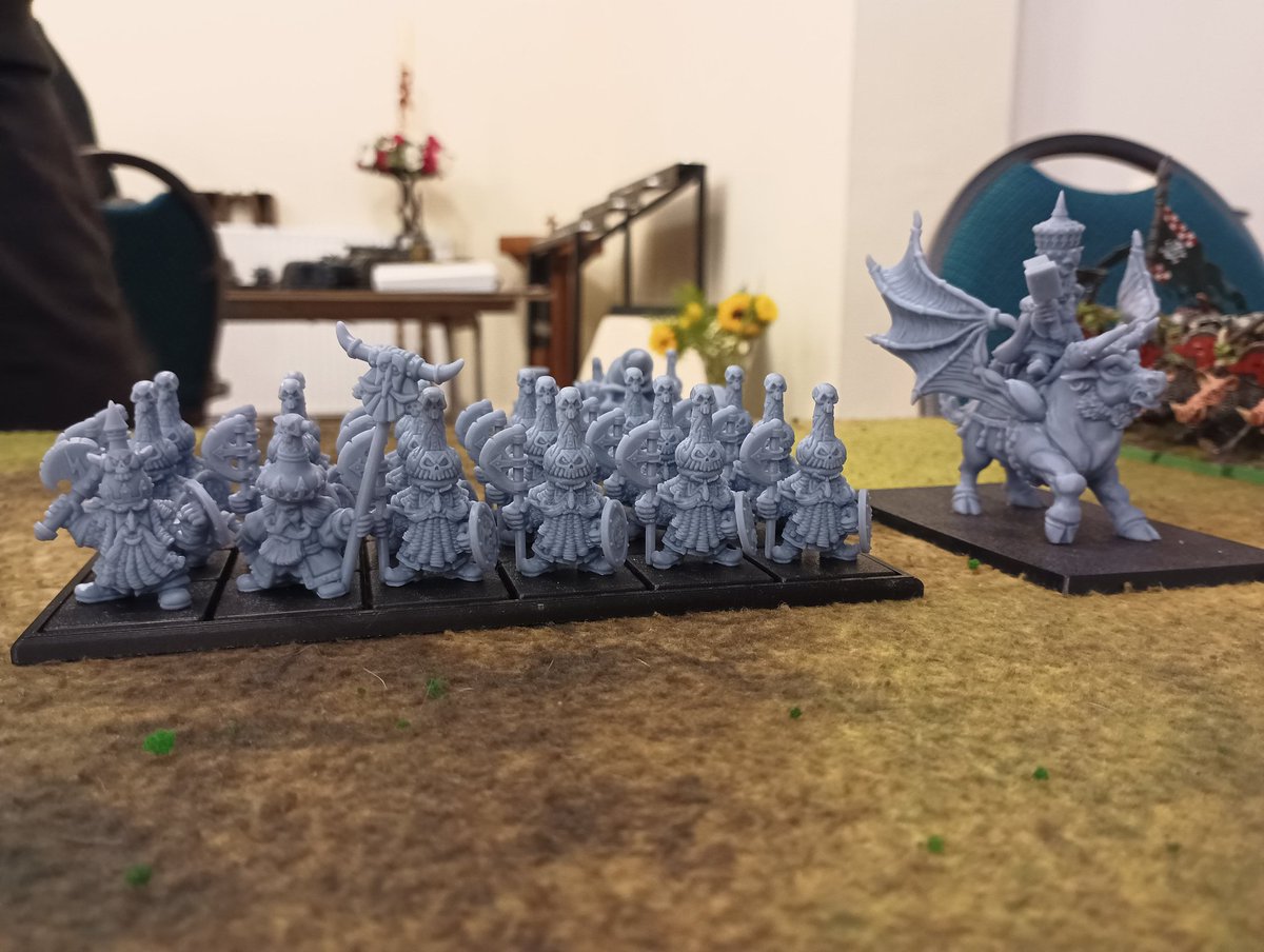 I had a fantastic game of The Old World tonight down at the club, my Nomadic Waaagh versus my friend's brand new chaos dwarfs, fresh off the printer (hence why they're not painted).