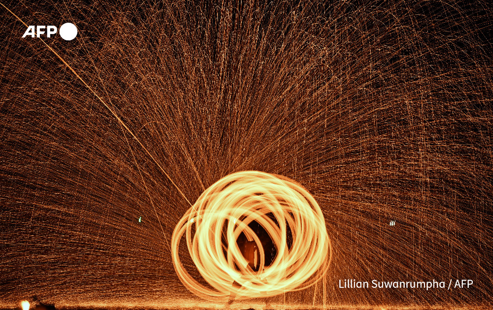 AFP's tweet photo. Playing with fire.

@AFP’s Lillian Suwanrumpha photographs fire dancers performing on a beach on the Thai island of Koh Samui https://t.co/SY2ynMk5MX