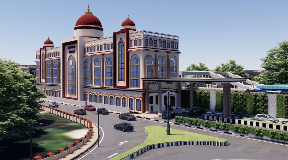 VSOMANNA_BJP's tweet photo. The proposed view of Tumakuru Station after upgradation, which aims to become a beacon of passenger-friendly amenities and a gateway to our city's growth. The station's facade will be a stunning tribute to the revered Sri Siddaganga Math, reflecting the rich cultural heritage of our Tumakuru.  

Beyond its aesthetic appeal, the upgraded station will offer a host of modern passenger-friendly amenities, including Multi-level parking , Retail spaces, modern passenger lounges and waiting halls, separate entry & exit, and additional platforms to meet the future needs of the city.