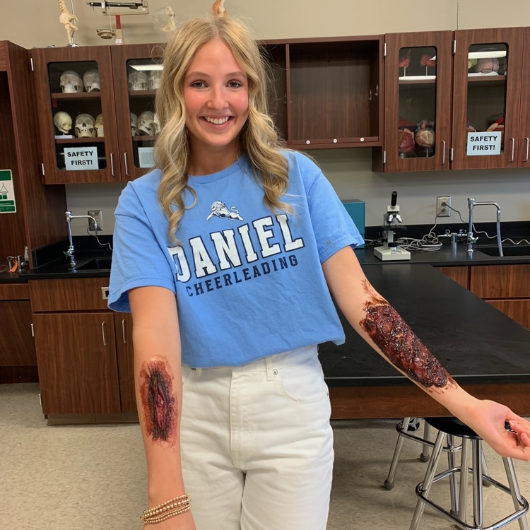DWDanielHigh's tweet photo. Exploring wounds, sutures, and bones with Ms. Justus in Anatomy and Physiology, while Coach Burk's Bio class tackles the ultimate popcorn price comparison! And underclassmen picture day! #day019 #oneDANIEL https://t.co/AXOSeTH8XQ