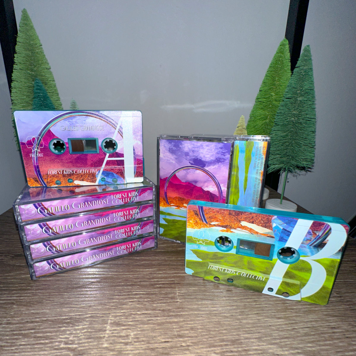 Galileo Grandiose ---- [Cassette]
forestkids.bandcamp.com/album/galileo-…

💠 Professionally Dubbed 💠
💠 Dual Sided Design 💠
💠 Full on-body print 💠
💠 Clear Turquoise Shells 💠
💠 High Quality Printed J-Cards 💠
💠 Mastered for Cassette by <a href="/angelhairaudio/">Angel Hair Audio LLC 🍝🎧 Mixing & Mastering</a> 💠