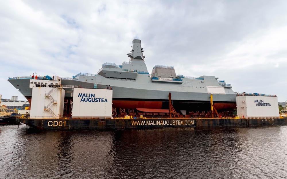 HMS Belfast being floated down the Clyde past Braehead ready for “launch”.
Photos by Allan Picken on Facebook.