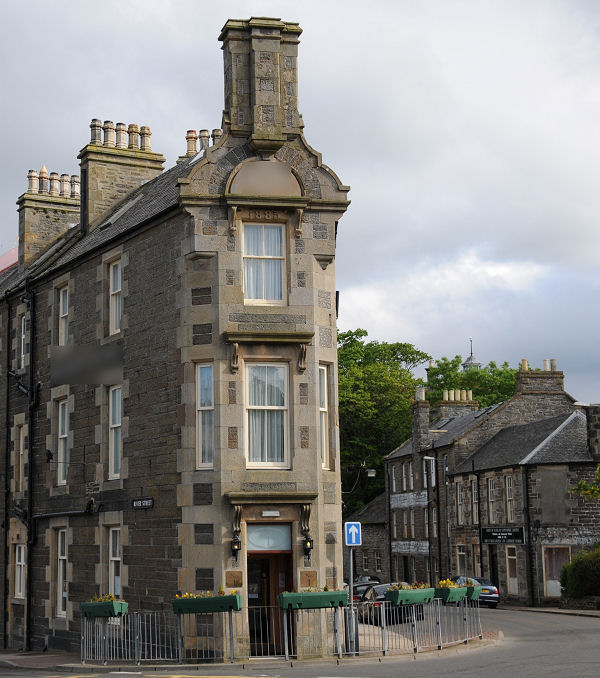 WHERE IN SCOTLAND?

Where is this?

This is a detail from an image that appears somewhere on Undiscovered Scotland. Please reply with your answers. We'll award kudos to the first correct response before posting the next in the series tomorrow. Some signs have been obscured.