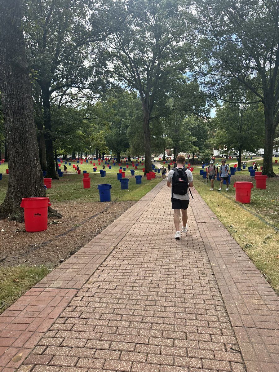 CoastRebDMR's tweet photo. My home game wekeend ritual complete. #TrashcanFriday #WalkofChampions #OleMiss #HottyToddy #BeatFurman 💙❤️ https://t.co/eM6cDP9Qfn