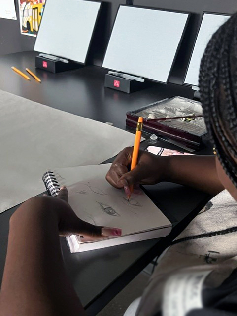 TECCEdesign's tweet image. Taking a little brain break at our Zen table. Sketching eyes helps us relax after a stressful morning. @lisdcte @TECCeast #sketching #StudentDesignHaus #GraphicDesign