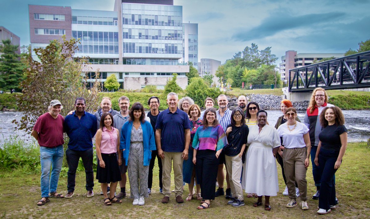 Simply could not be prouder of this team of Journalism faculty members and staff <a href="/JSchool_CU/">Carleton J-School</a>, the best in the country. The spectacular home to Carleton's journalism program is behind us we gather for a retreat ahead of next week's beginning of classes. (photo: Eddie Benhin)