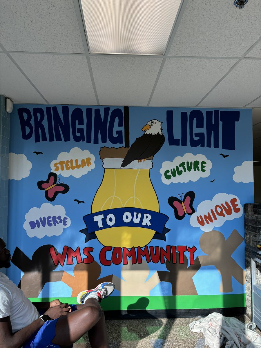 Last year, Mr. Jones tasked his 8th grade class with creating a mural to represent our WMS community. Students researched and interviewed members of our community to discover what they felt represented our school. Administration chose the mural that best reflected our values.