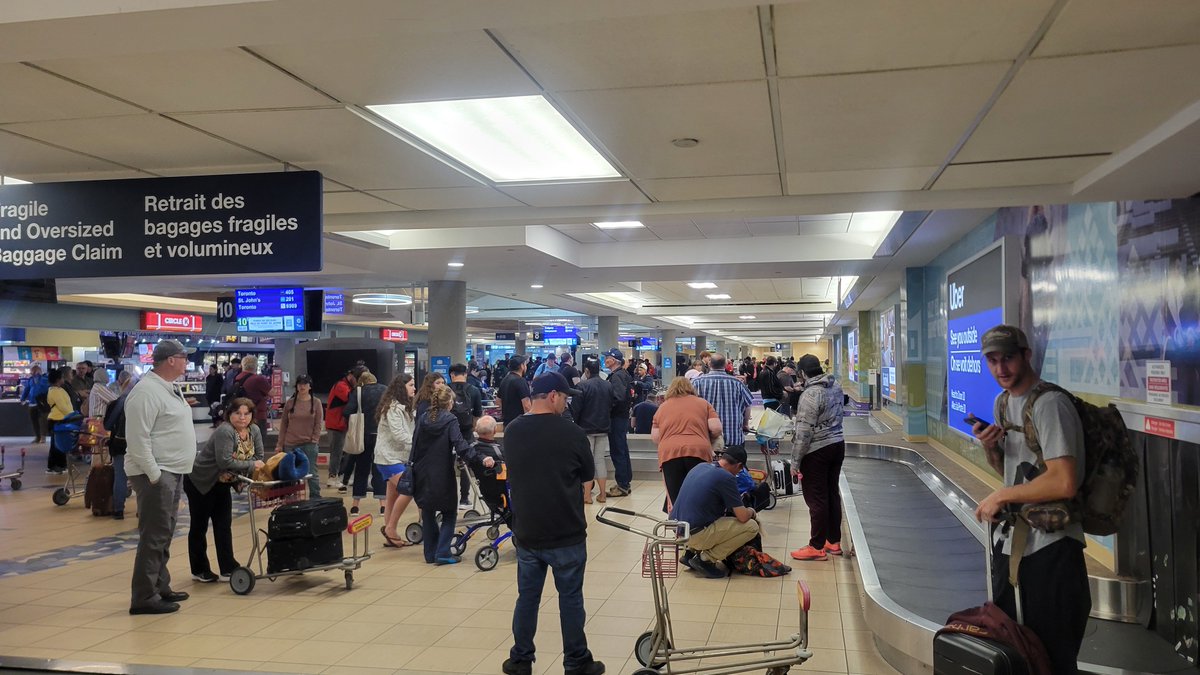 Pathetic scenes from #YEG <a href="/FlyYEG/">Edmonton International Airport</a> <a href="/WestJet/">WestJet</a>. Hundreds of people waiting an hour (and counting...) for our bags. Totally frustrating. But I doubt <a href="/FlyYEG/">Edmonton International Airport</a>  <a href="/WestJet/">WestJet</a> care much. Zero staff on site. People left wondering what the heck is going on.