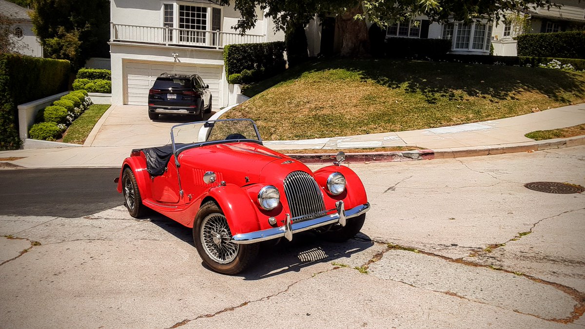 EastWordsMedia's tweet photo. The Mystery of the Misplaced Morgan
This #MorganPlus4 was sitting halfway into the intersection, engine off, with its tonneau cover snapped tightly in place. No skid marks or scratches or debris on or around it. And nary a soul in the immediate vicinity. How did it get there? https://t.co/WEDMQOpxlL