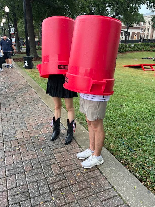 When a sudden storm hits Tuscaloosa before the gates open at the football stadium, and this is the only cover you can find from the rain …