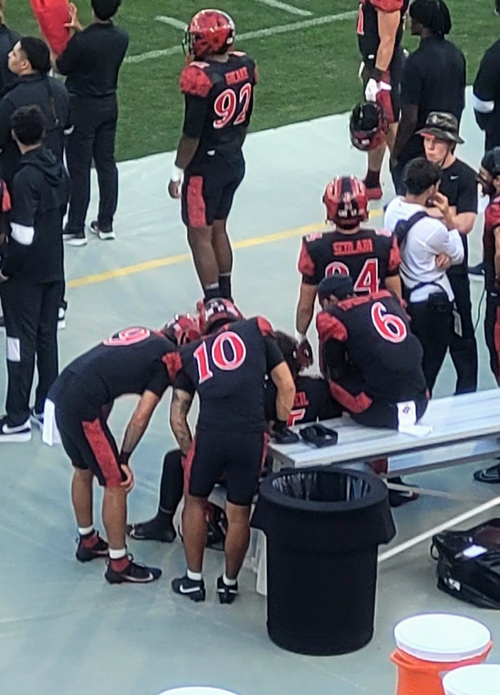 QB Room gathering around starter Danny O'Neil.