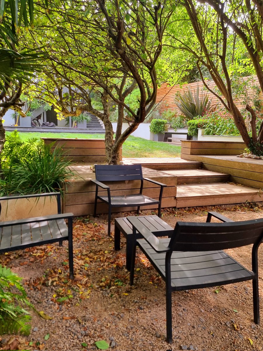 Late summer and early autumn is a good time to enjoy the garden. Tables and chairs positioned where you can have a good view are a must. Evergreen plants will keep the structure during the winter months. And yes, persicarias are late flowering perennials if you