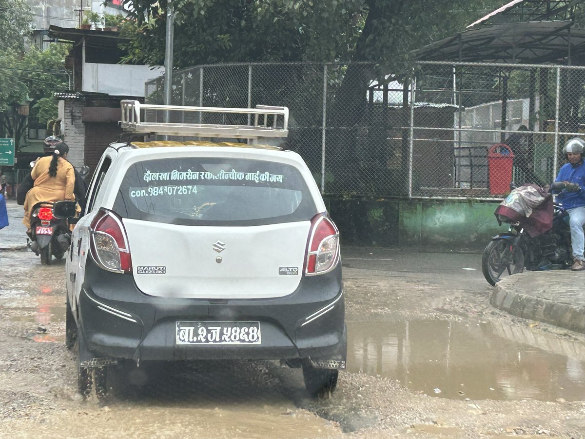 BishowParajuli's tweet photo. Saw a section of road road in busy section of Naxal, heart of kathmandu, in disgraceful & terrible condition. Important: let us fix the inconvenience people are facing daily first : where is the #RoadDept/ @ktm_metro ? https://t.co/7Qg2dnWtx7