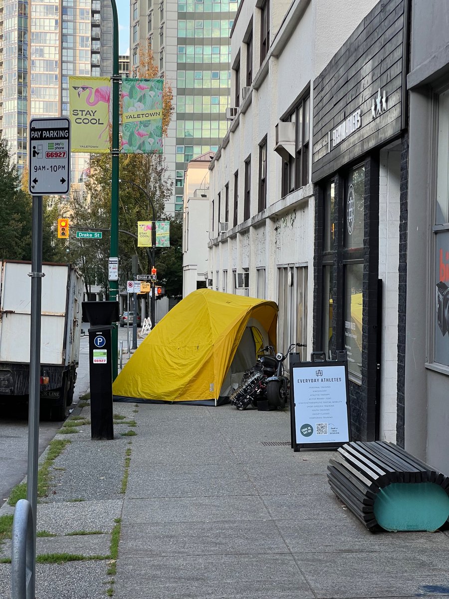 Pleasant Sunday morning. Homeless person camped on the 1200 block of Homer St like he owns the place. Kind of does now. <a href="/VancouverPD/">Vancouver Police</a>