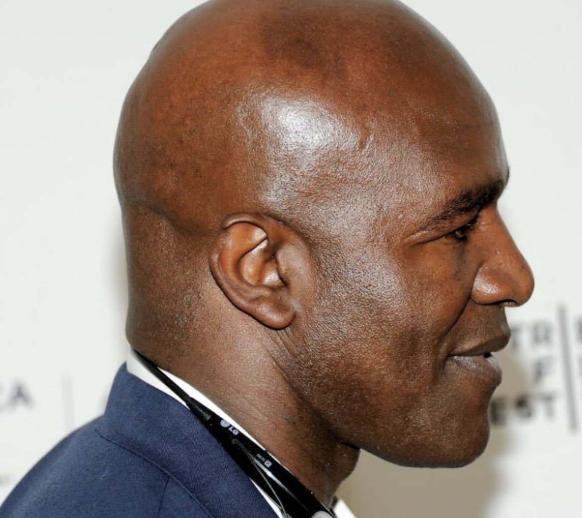 RonFilipkowski's tweet image. All these years later, Evander Holyfield is still missing the piece of the ear Mike Tyson bit off. Probably just not as fast a healer as Trump.