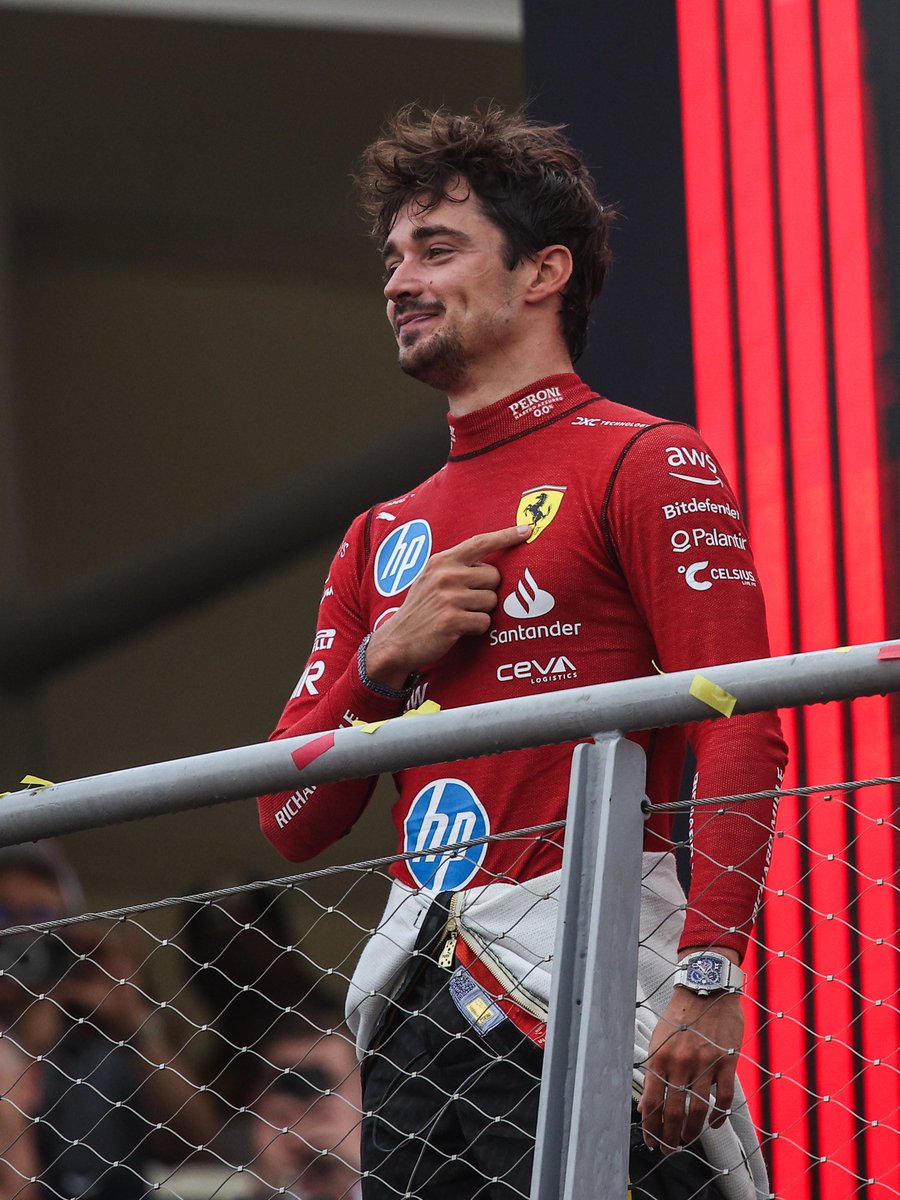 leclercsletters's tweet photo. every angle of charles pointing to the ferrari logo has me sobbing. https://t.co/YT9NWmly3d