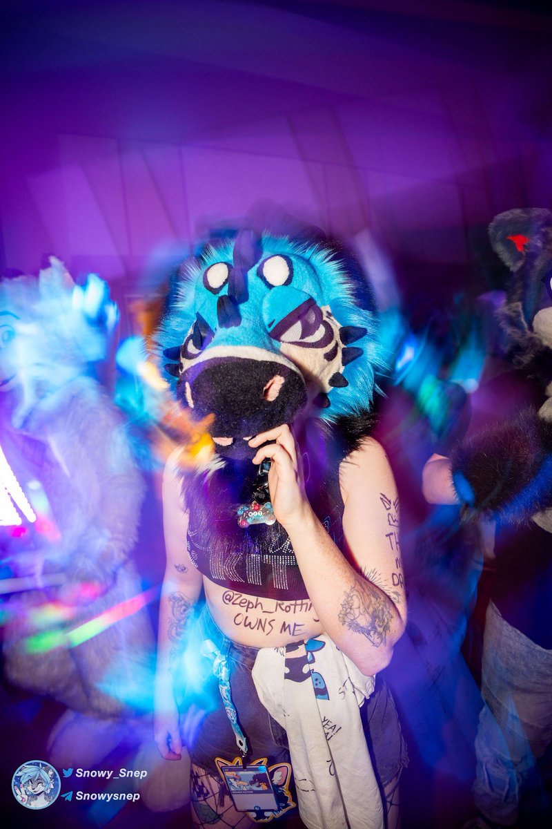 snarlykit's tweet photo. In the haze of the music 
•
📸: @snowy_snep 
✂️: @stuffedtailsfursuits https://t.co/aziJceaB4f