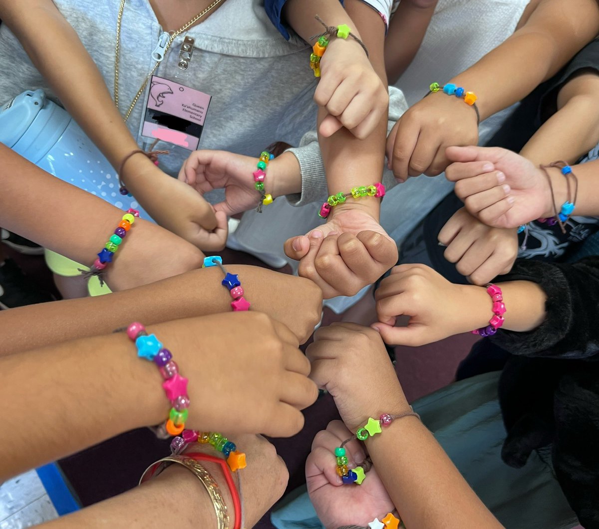 Celyendo's tweet image. A3: #teachpos @Shapiro_WTHS I love your Q3 graphic because it mimics the code.org binary “byte” bracelets we made schoolwide to spark friendships &amp;amp; support at the beginning of the year. Kids love the connection &amp;amp; we’ll make them at our faculty mtg too! #CSceleste
