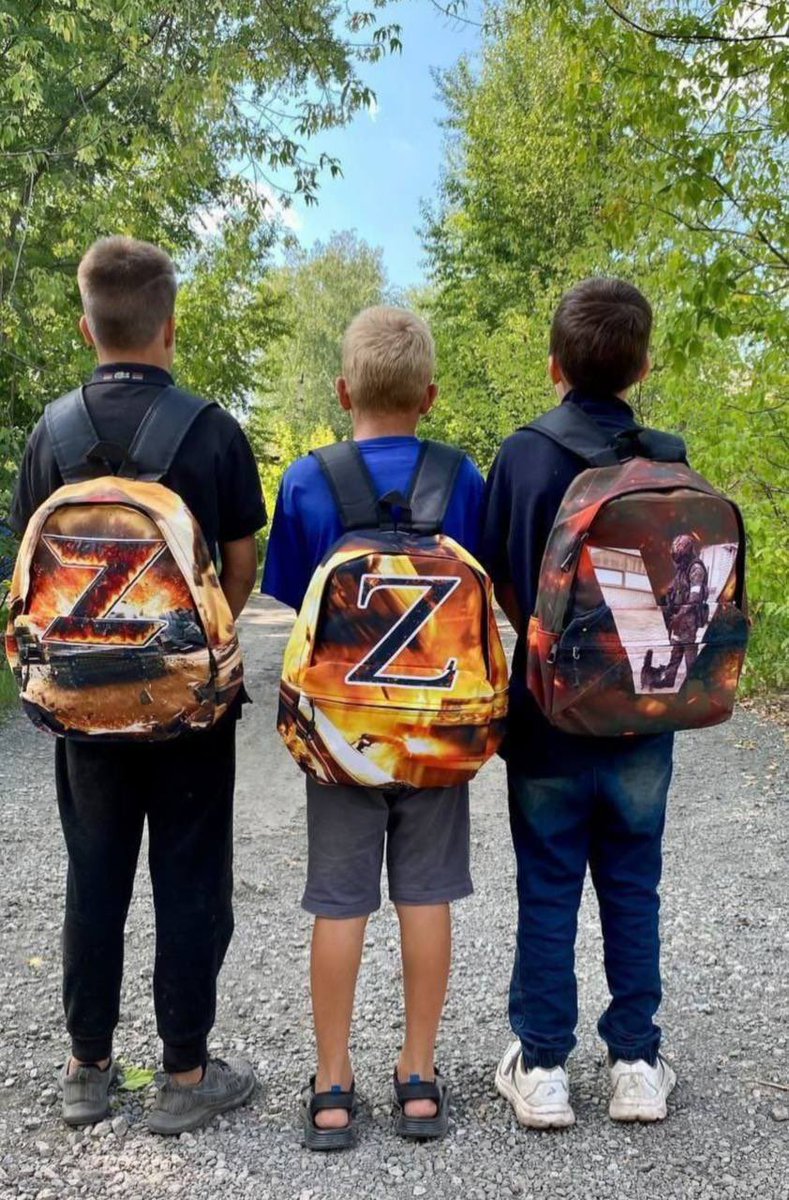 sumlenny's tweet photo. It would be terrible, if Russian parents would have voluntarily bought their minor children school backpacks with symbols of genocide, rape, torture - and proudly photographed them. Oh, wait. #NotOnlyPutin https://t.co/WvhW3SWf0j