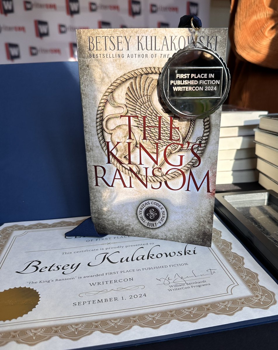 AuthorBetseyK's tweet photo. What’s it like to be wake up with a gold medal around your neck? It feels like hard work and persistence. It feels like dreams coming true. It feels like the beginning of much more to come. #authorlife #BookAward #FirstPlace #WriterCon #TheKingsRansom #TheVeritasCodexSeries https://t.co/kLEECYKHzG