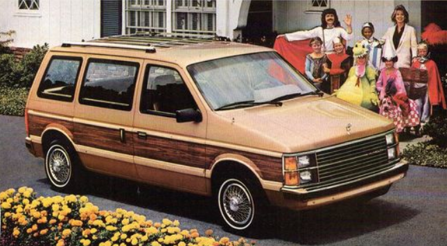 DaveDuricy's tweet photo. Doug Henning: "It's the magic wagon! Enjoy room for five while your standard of living magically disappears!" 1985 Plymouth Voyager. #Automobile #cars #ClassicAgain #80s https://t.co/qqAB9YUDWZ
