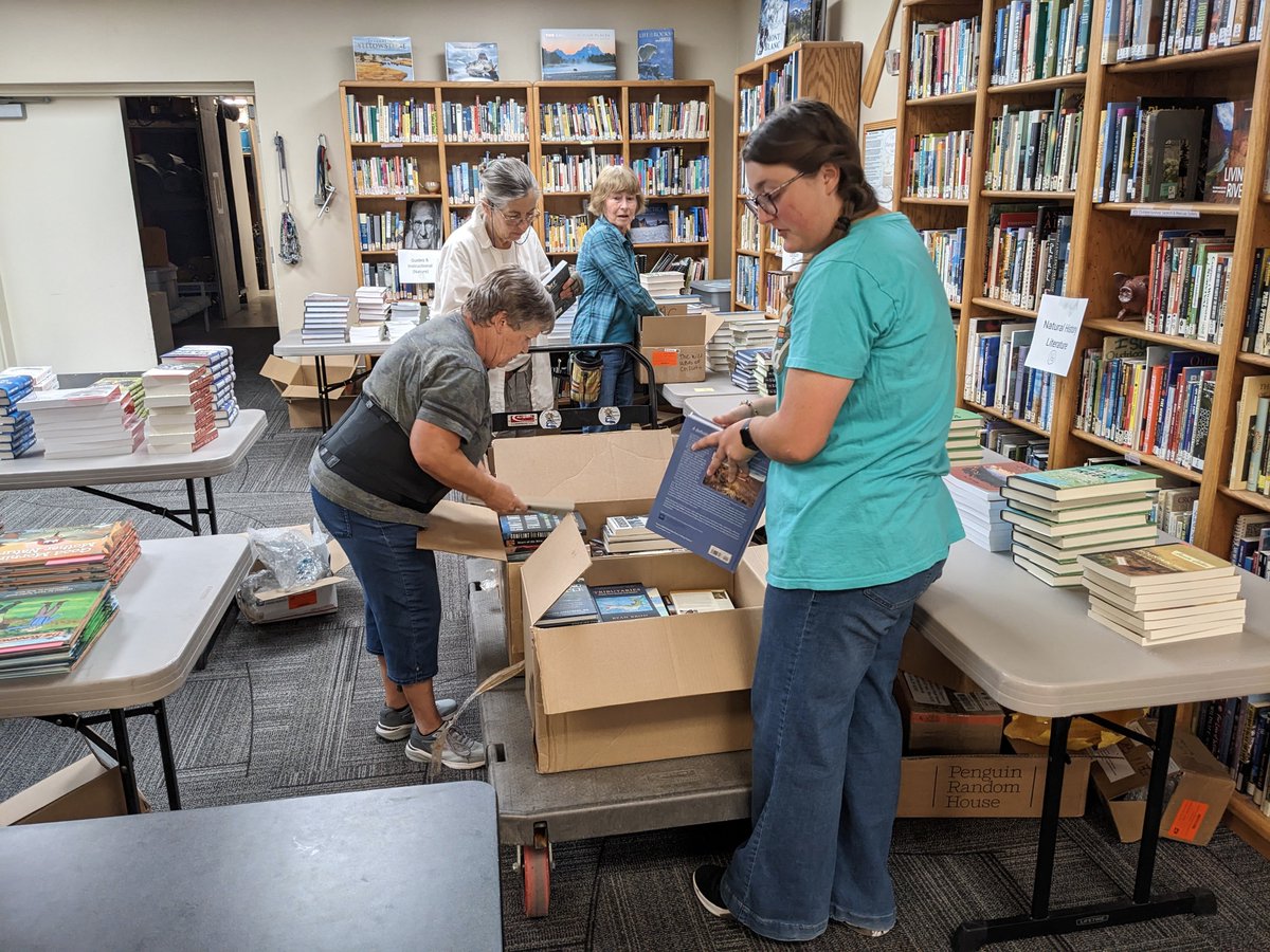 All  entries in the 2024 National Outdoor Books are now in the hands of the  judges.  A total of 165 entries were submitted by publishers this year,  the highest ever in the program's 28-year existence.  Pictured below,  volunteers are preparing the judges' packages.
