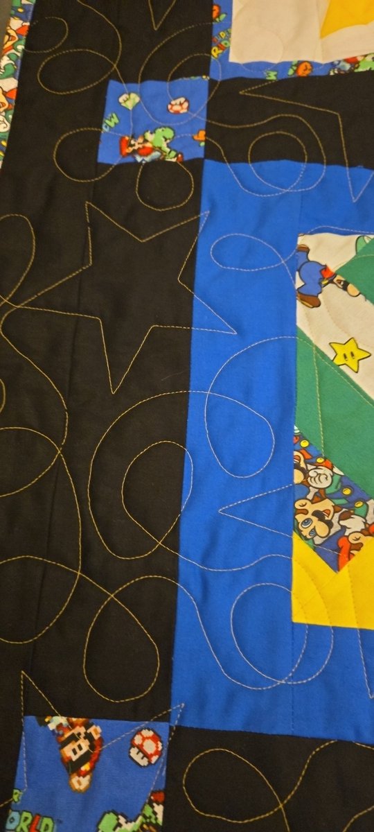 chive5's tweet image. I've been wanting to start quilting for a while, and I finally had time this summer. I just got it back from the quilter yesterday, and I had the compulsion to bind it tonight. I am SO happy with how it turned out!