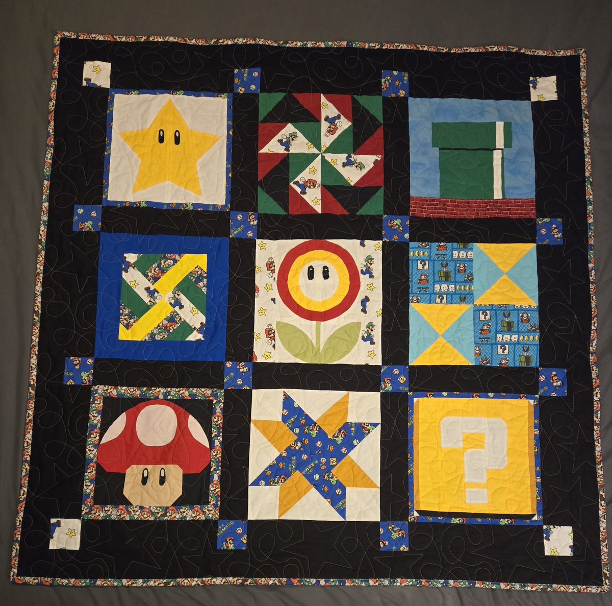 chive5's tweet image. I've been wanting to start quilting for a while, and I finally had time this summer. I just got it back from the quilter yesterday, and I had the compulsion to bind it tonight. I am SO happy with how it turned out!