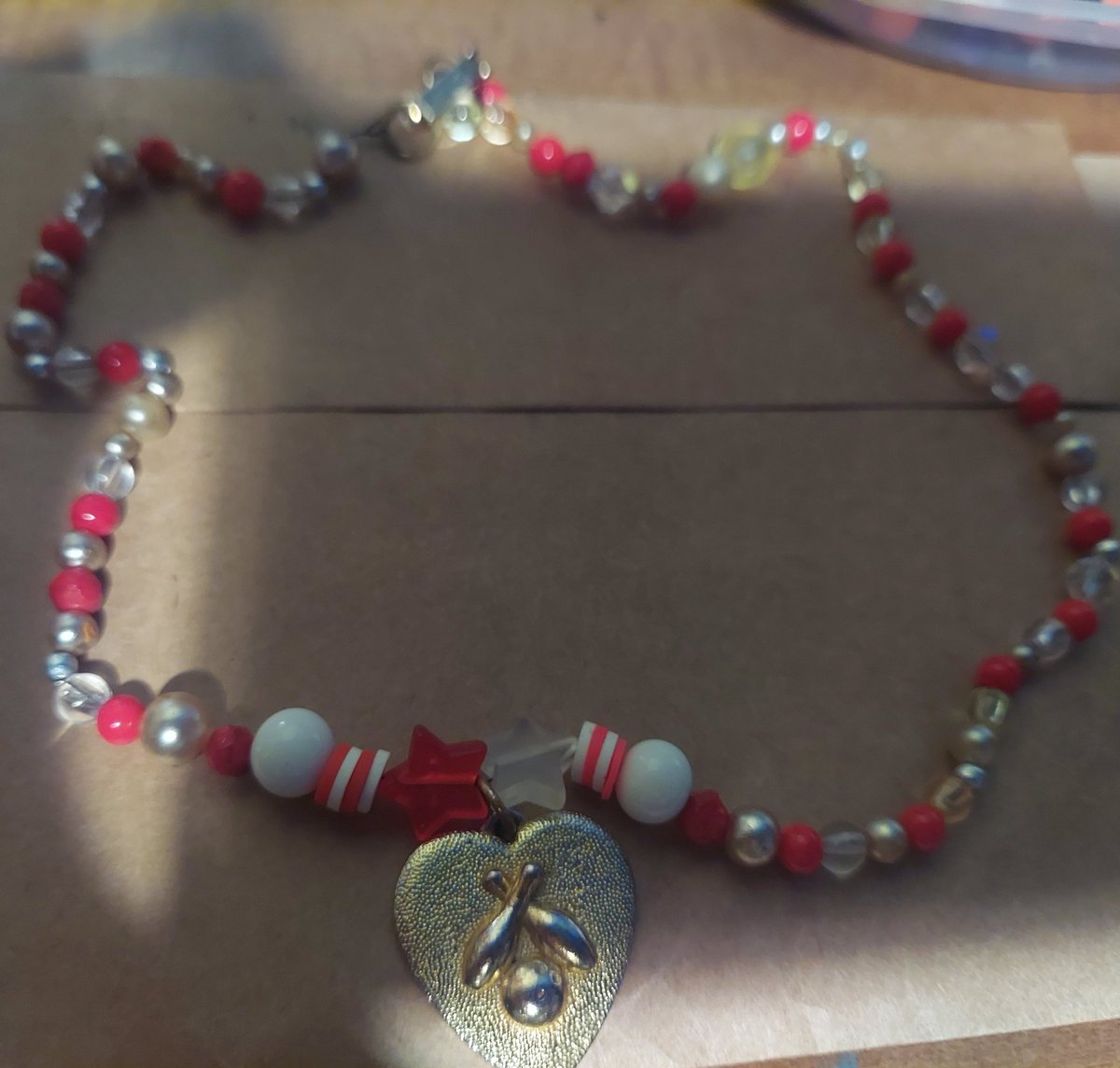 nolanthinkr's tweet photo. thinking about the time I made a necklace inspired by nolan's minecraft skin :) https://t.co/apxSRuPwOH