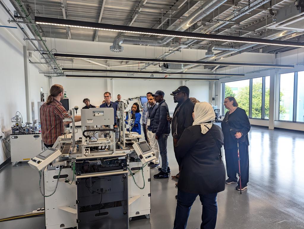 Conference (@uosconference) on Twitter photo Delegates attending the IIMA conference <a href="/SalfordUni/">University of Salford</a> looking at robots in our fascinating NERIC building #academicvenues Delegates attending the IIMA conference <a href="/SalfordUni/">University of Salford</a> looking at robots in our fascinating NERIC building #academicvenues