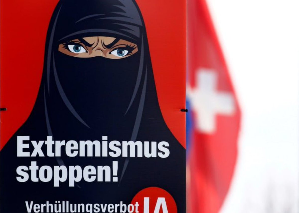 🚨🇨🇭 A Suíça proibiu o burqa por referendo, considerando-o um ato de terrorismo.

O povo suíço decidiu banir o burqa.

A proibição foi publicada no código penal e os infratores podem ser multados em até 1.000 francos suíços.

E no resto da europa, não deveria ser assim também?