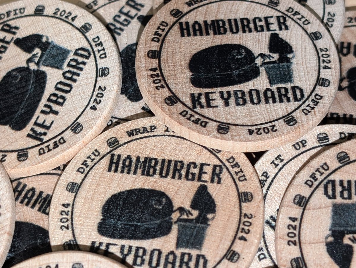 I_CAN_COMPUTER's tweet photo. This year we went a little overboard and backwoods on our con coin. 100% biodegradable and 70% quieter when dropped!
Come find me for one while at @GrrCON! #HamburgerKeyboard https://t.co/Il5TE3J8mG