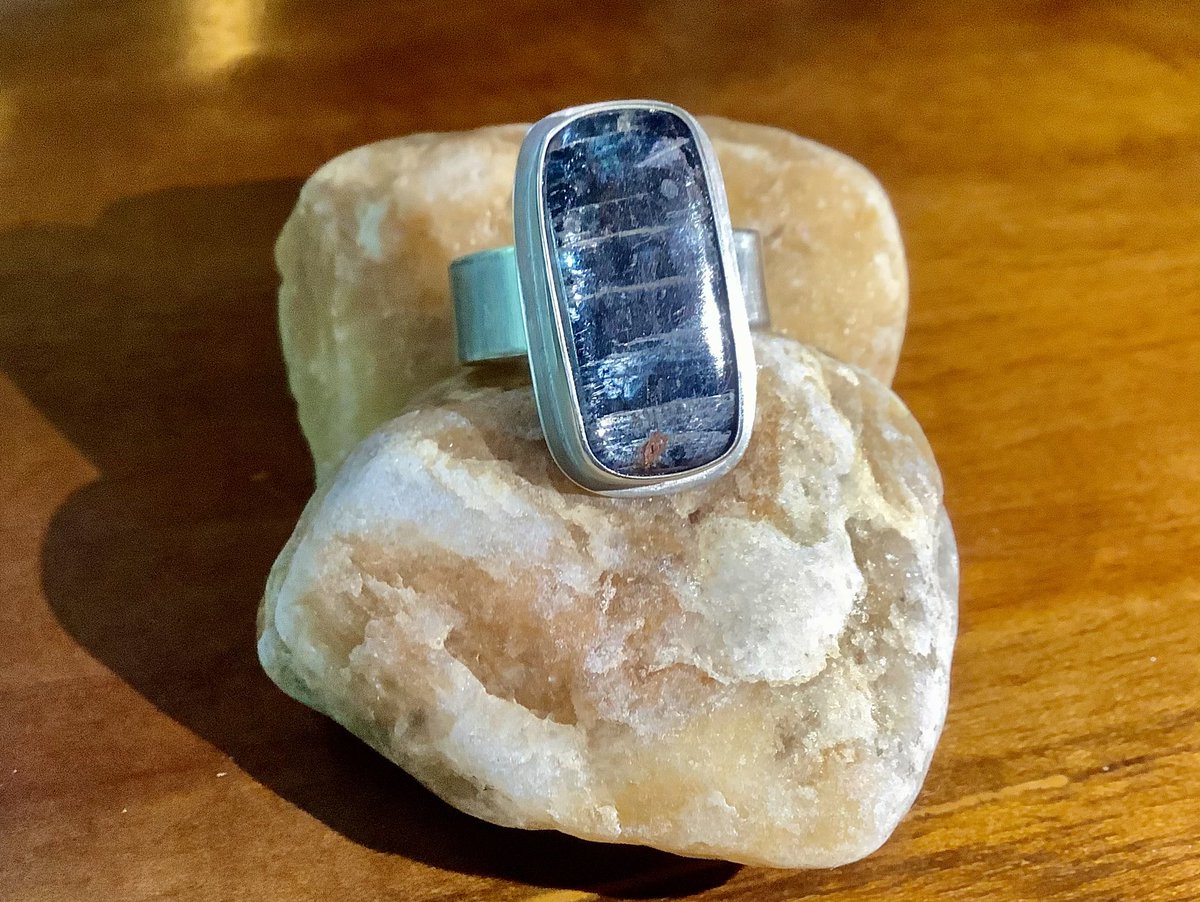 17.3 ct. Blue Kyanite cabochon, set in a hand-crafted, .925 silver ring setting. Beautiful translucency in this stone. 💕 Unisex ring. 
blueridgesilverandstone.com