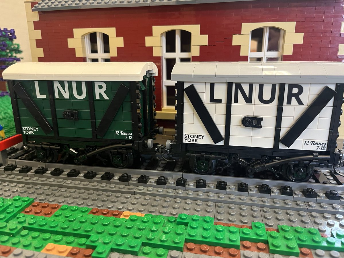 LNURailway's tweet photo. A selection of wagons from Member Weekend - including Andrew’s award winning iron ore hopper wagon #lego #legotrains #lgauge https://t.co/ZgZY3W1ARR